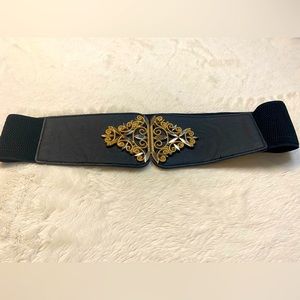 Wide black belt with gold plated buckle
